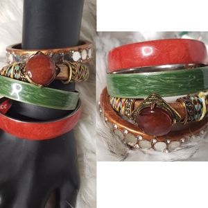 4 Set of stone and inlaid bracelets.